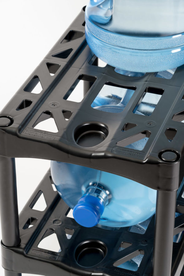 Close up of water bottle rack drip tray